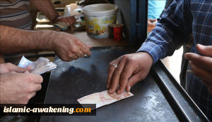 المجموعات الارهابیة تمنع تداول اللیرة السوریّة فی ادلب