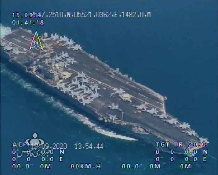 البحریة الإیرانیة تنشر صوراً لاعتراض حاملة طائرات أمیرکیة من قبل مسیرات وطنیة الصنع