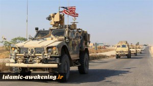 Two roadside bombs hit US-led coalition convoys in Baghdad, central Iraq